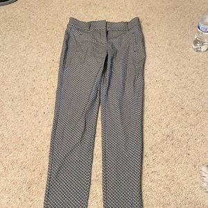 Woman’s dress pants color white and black size small